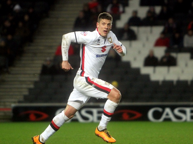 Striking Places Sponsor MK Dons Striker Alex Revell